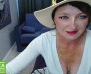 lesia_69 is a 42 year old female webcam sex model.