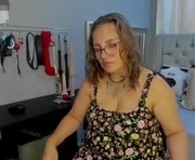 carolinacrus01 is a 42 year old female webcam sex model.