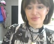 quiet_smile is a  year old female webcam sex model.