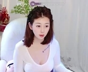 wenwen170 is a 22 year old female webcam sex model.