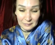 prettyandwild is a 50 year old female webcam sex model.