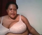 ebony_magixs is a  year old female webcam sex model.