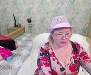 flowerlover8 is a 62 year old female webcam sex model.