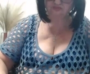 peggysoft is a 62 year old female webcam sex model.