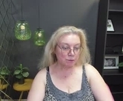 natalicloud is a 55 year old female webcam sex model.