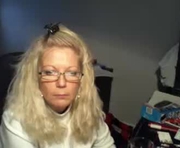 1ssuperwet is a 50 year old female webcam sex model.