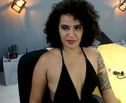 cinnamon_afrodit is a 26 year old female webcam sex model.