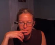 1xtrahornyone is a 50 year old female webcam sex model.