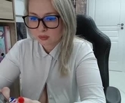 schoolteach is a 44 year old female webcam sex model.