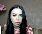 black_angelll_ is a 19 year old female webcam sex model.