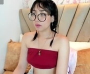 yuna__min is a 22 year old female webcam sex model.