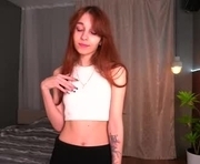 kitsun_ne is a 18 year old female webcam sex model.