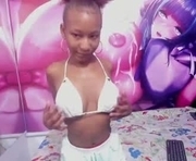 litte_ebony is a 18 year old female webcam sex model.