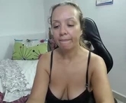 saray1221 is a 50 year old female webcam sex model.