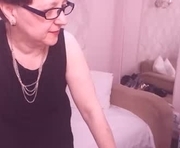 christarose is a 55 year old female webcam sex model.