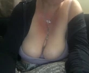 tits2suck is a 51 year old female webcam sex model.