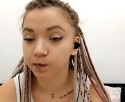 tiffanyrawi is a 18 year old female webcam sex model.