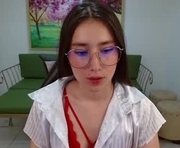 adhara_kitten is a 21 year old female webcam sex model.