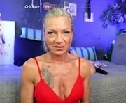 trophy_milf is a 44 year old female webcam sex model.