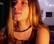 _sensualia_ is a  year old female webcam sex model.