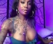 tatted_vixen is a 43 year old female webcam sex model.
