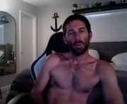 traviskenn is a 39 year old male webcam sex model.