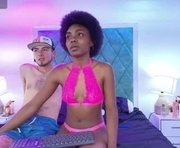 asha_zuri_and_adam is a  year old couple webcam sex model.