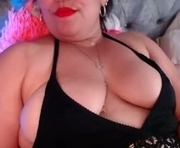 zahi_willx is a 44 year old female webcam sex model.