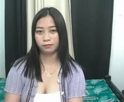 pinay_dhalia is a  year old female webcam sex model.