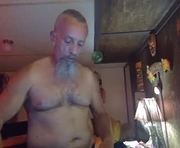 tha_commander69 is a 56 year old male webcam sex model.