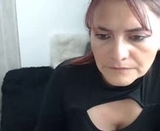 meganmilf_ is a 46 year old female webcam sex model.
