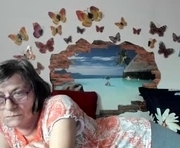 badgg is a 59 year old female webcam sex model.