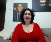 naughtykorin is a 50 year old female webcam sex model.