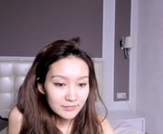 seon_mi is a 21 year old female webcam sex model.