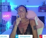 selvaggia_del_caribe is a 50 year old female webcam sex model.