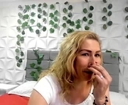lilyqueen_cg is a 54 year old female webcam sex model.