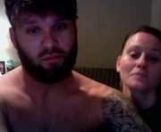 justu52 is a  year old couple webcam sex model.