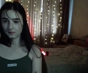 krisbadass is a  year old female webcam sex model.