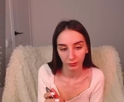 ellzabeth_ellison is a 18 year old female webcam sex model.