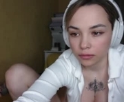 sweetraspberrytina is a  year old female webcam sex model.